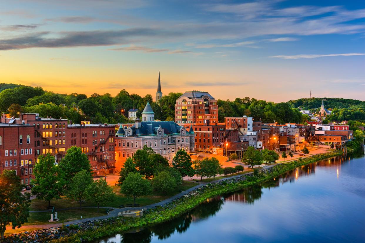 Augusta, Maine, USA downtown skyline on the Kennebec River.