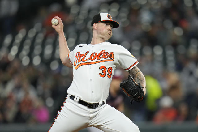 Orioles, playing with 'heavy heart,' shut out Nationals, 1-0