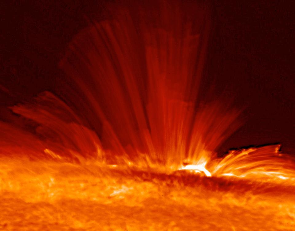 UNSPECIFIED - CIRCA 1754: Sunspot with streamers of super-hot, electrically charged gas (plasma) arc from the surface of the Sun, revealing the structure of the solar magnetic field. Credit NASA. (Photo by Universal History Archive/Getty Images)