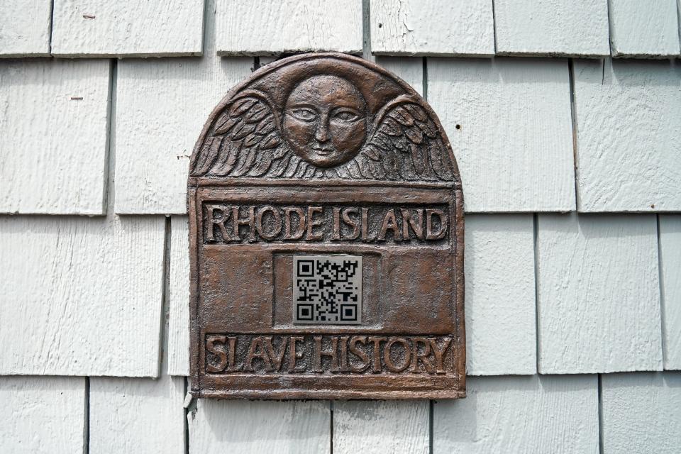 A close-up of the Slave Medallion located at Bowen's Wharf.