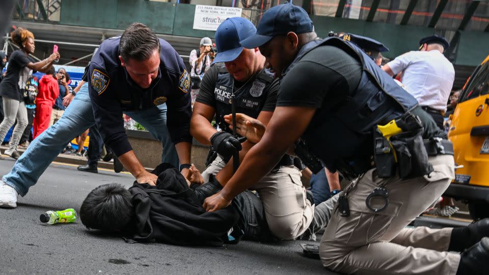 Members of the NYPD arrest people in Union Square and the surrounding area on August 4, 2023 in New York City.  - Alexi J. Rosenfeld/Getty Images