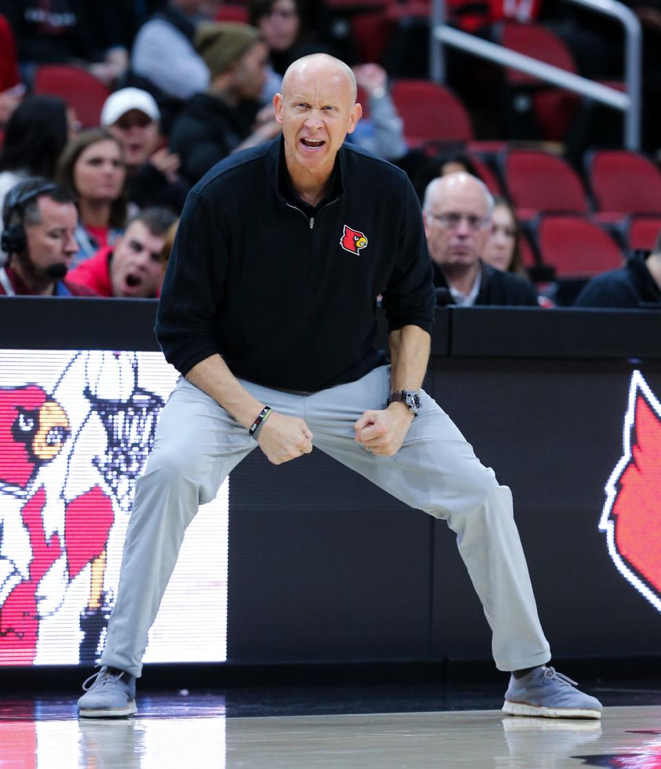 U of L head coach Chris Mack tries to get a player's attention against West Georgia during their game at the Yum Center in Louisville, Ky. on Nov. 3, 2021.