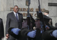 U.S. Defense Secretary Lloyd Austin reviews the honor guard during a welcome ceremony in Kyiv, Ukraine, Tuesday, Oct. 19, 2021. (Gleb Garanich/Pool Photo via AP)