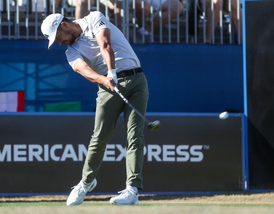 Xander Schauffele tees off on the first hole at on the Pete Dye Stadium Course at PGA West during The American Express in La Quinta, Calif., Jan. 21, 2023. 