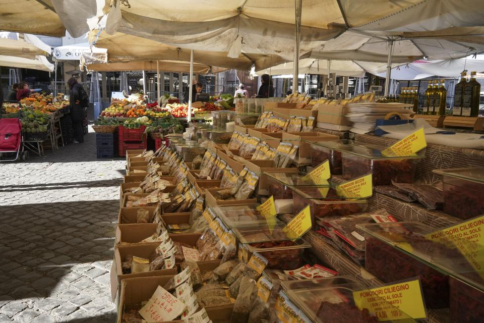 Food lies untouched at the Campo del Fiori open-air market in Rome, which has been starved of customers.