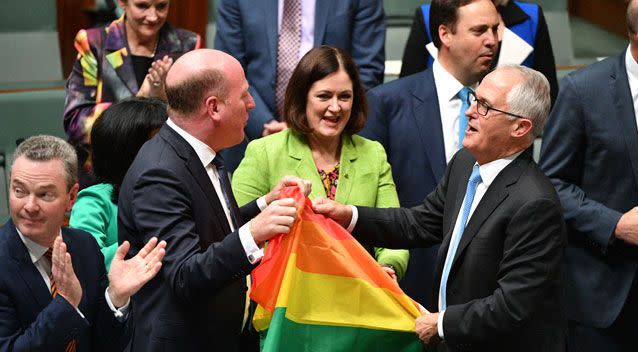 There was celebration in the chamber as the new laws cleared parliament unchanged. Photo: Getty