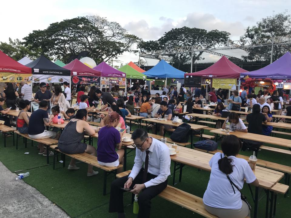 Stalls and seating area at Chatuchak Night Market Singapore. (PHOTO: Lim Yian Lu/Yahoo Lifestyle SEA)