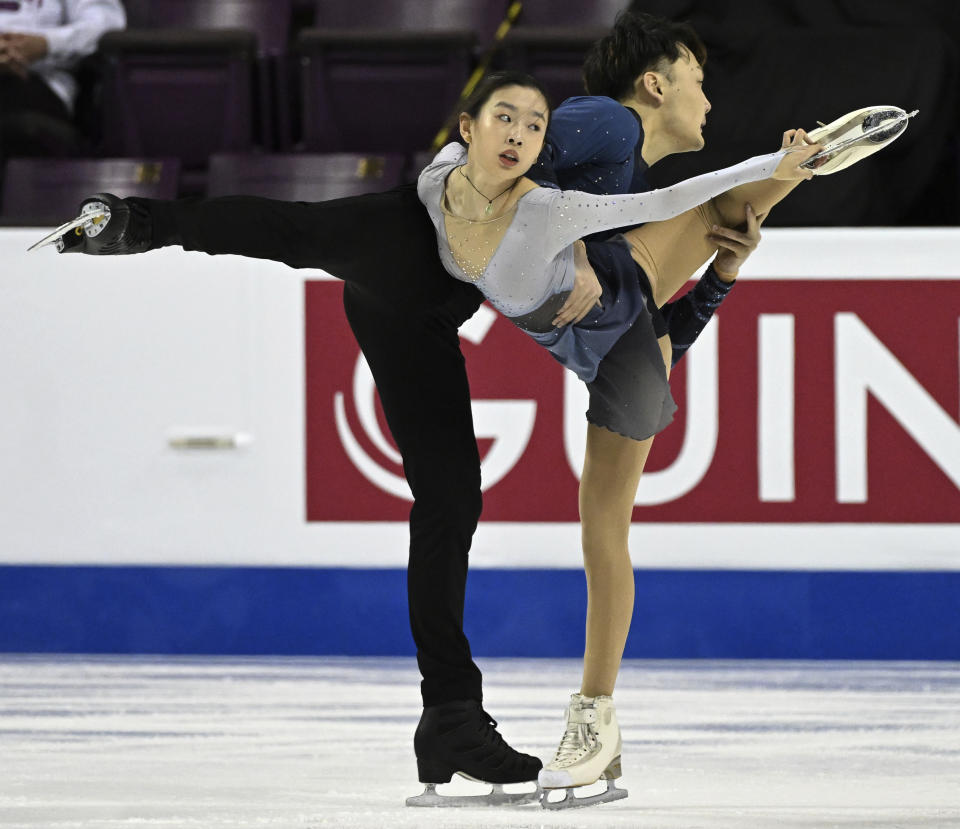 Siyang Zhang and Yongchao Yang of China compete in the pairs free skating at the Four Continents Figure Skating Championships, Saturday, Feb. 11, 2023, in Colorado Springs, Colo. (Christian Murdock/The Gazette via AP)