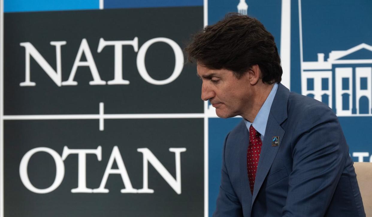 Prime Minister Justin Trudeau listens to New Zealand Prime Minister Christopher Luxon speak before a meeting at the NATO Summit in Washington on Wednesday, July 10, 2024. (Adrian Wyld/The Canadian Press - image credit)