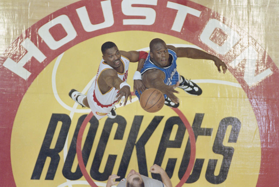 Hakeem Olajuwon and Shaquille O'Neal jumped center in the 1995 NBA Finals. (Getty Images)