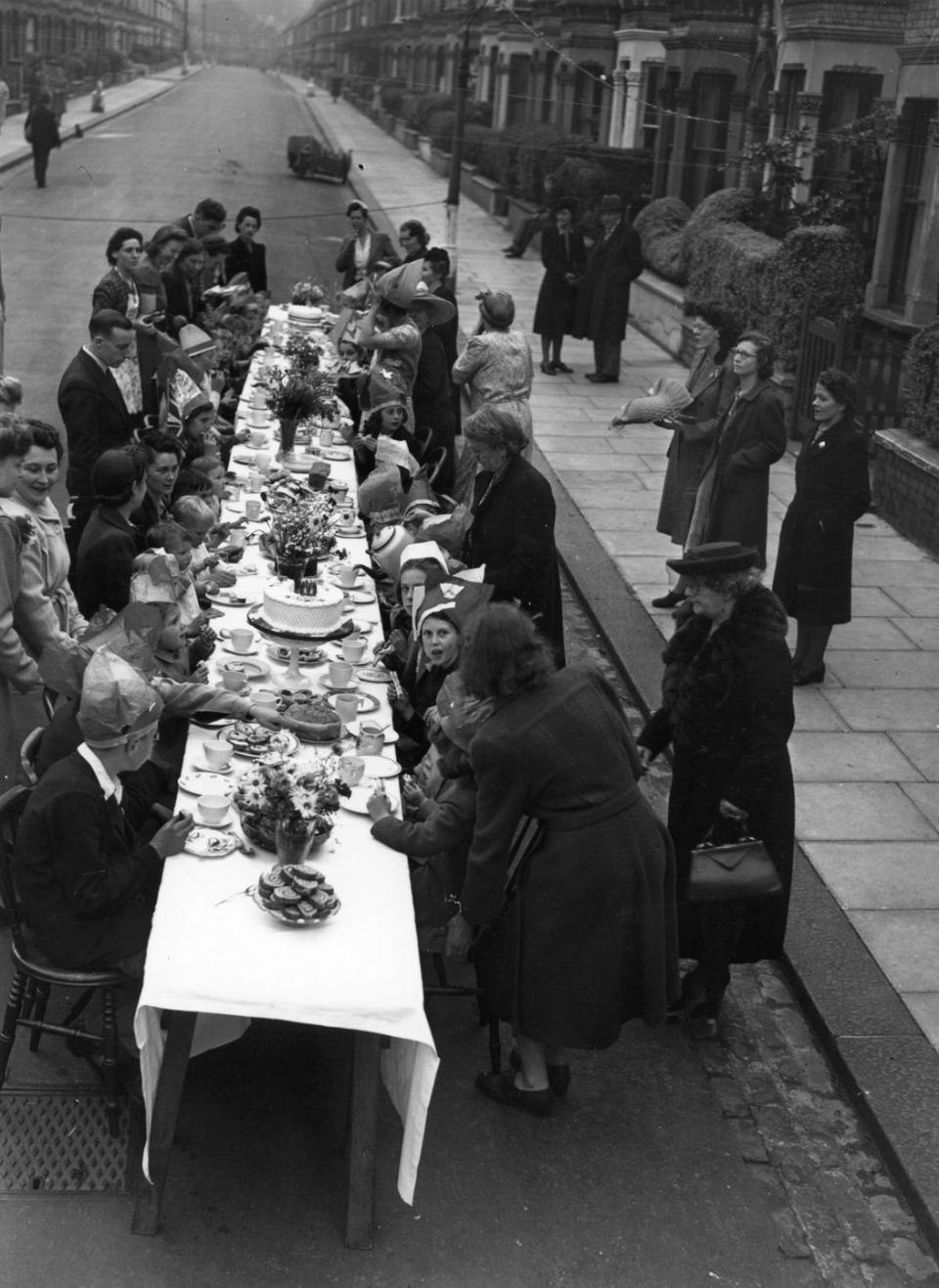 <p>A victory street party takes place near Clapham Common, London.</p>