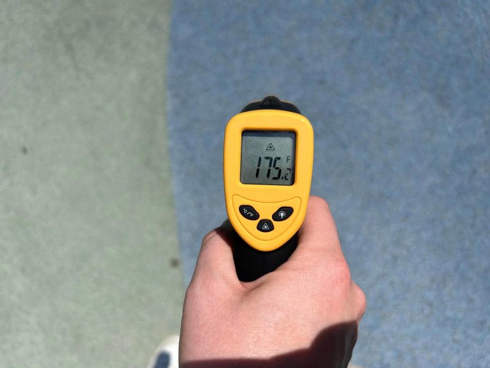 The rubber ground of a playground in Riverside Park measures 175 degrees Tuesday afternoon during ongoing extreme heat in Wichita.