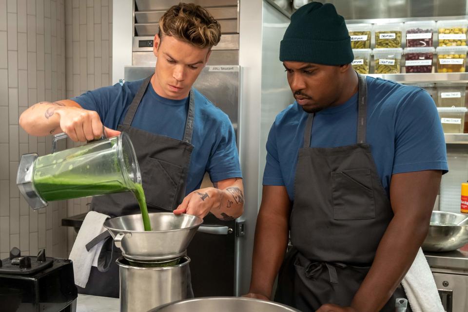 Will Poulter cooking in a kitchen alongside Lionel Boyce in The Bear