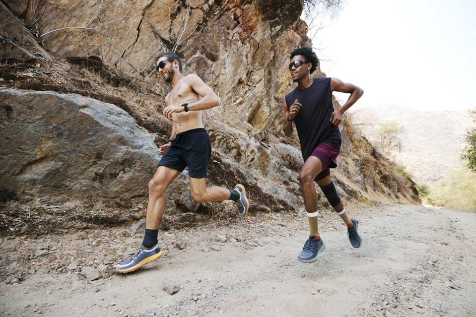 Runners in the Allbirds Trail Runner SWT in the “Telluride” (L) and “Natural Black” colorways. - Credit: Courtesy of Allbirds