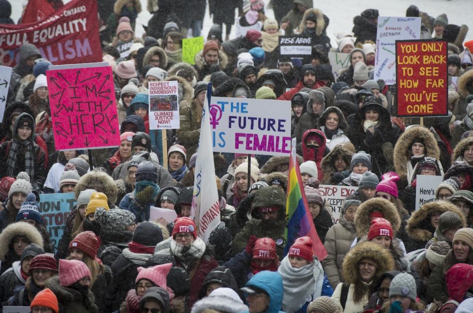 A large crowd gathers at Nathan Phillips Square for the start of the Toronto Women’s March in January 2019. THE CANADIAN PRESS/ Tijana Martin