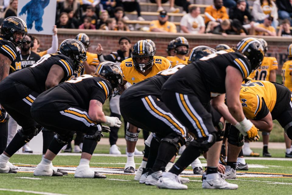 Missouri defensive end Darris Smith, center, waits to rush the edge after a snap during Mizzou's spring game March 16 on Faurot Field in Columbia.