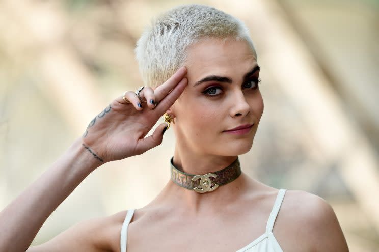 Cara Delevingne shaved her head for more than just a role [Photo: Getty]