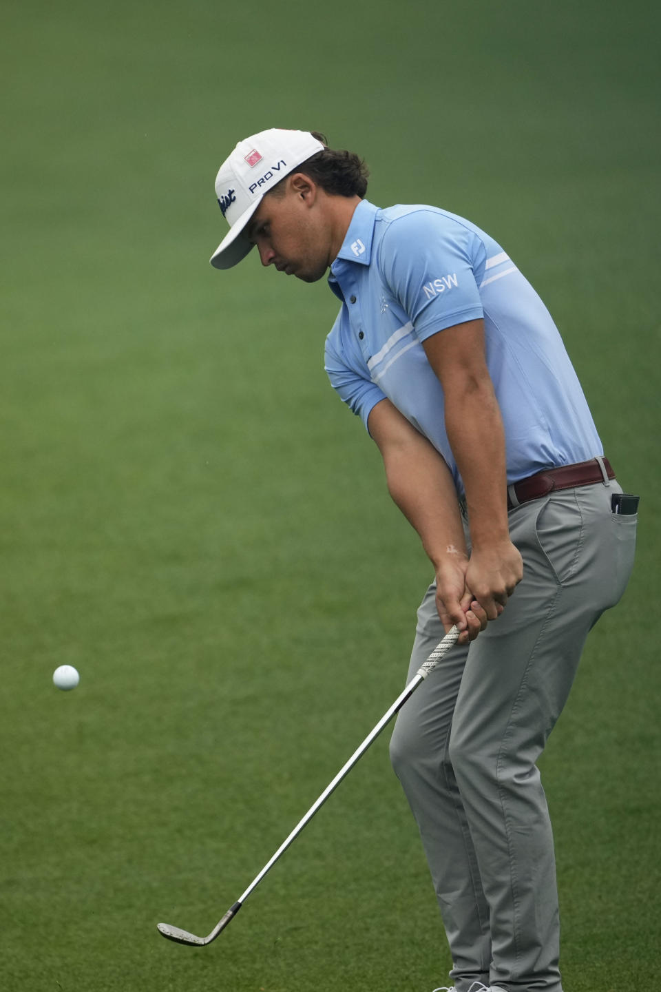 Harrison Crowe, of Australia, hits out of the 14th fairway during a practice for the Masters golf tournament at Augusta National Golf Club, Monday, April 3, 2023, in Augusta, Ga. (AP Photo/Matt Slocum)