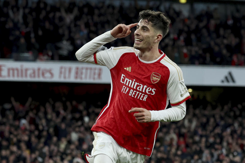 Arsenal's Kai Havertz celebrates after scoring his side's second goal during the English Premier League soccer match between Arsenal and Brighton and Hove Albion at the Emirates Stadium in London, Sunday, Dec. 17, 2023. (AP Photo/Ian Walton)