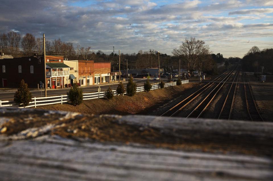 The sun rises on the Main Street business district in Lula, Ga., in Hall County, Thursday, Jan. 12, 2017. Trump draws his strength from places like Lula, a railroad town with 2,800 residents and no stop light in the central business district. He won almost three out of four votes cast in surrounding Hall County, which abuts the northeast quadrant of the multi-county cluster that makes up metro Atlanta. (AP Photo/David Goldman)