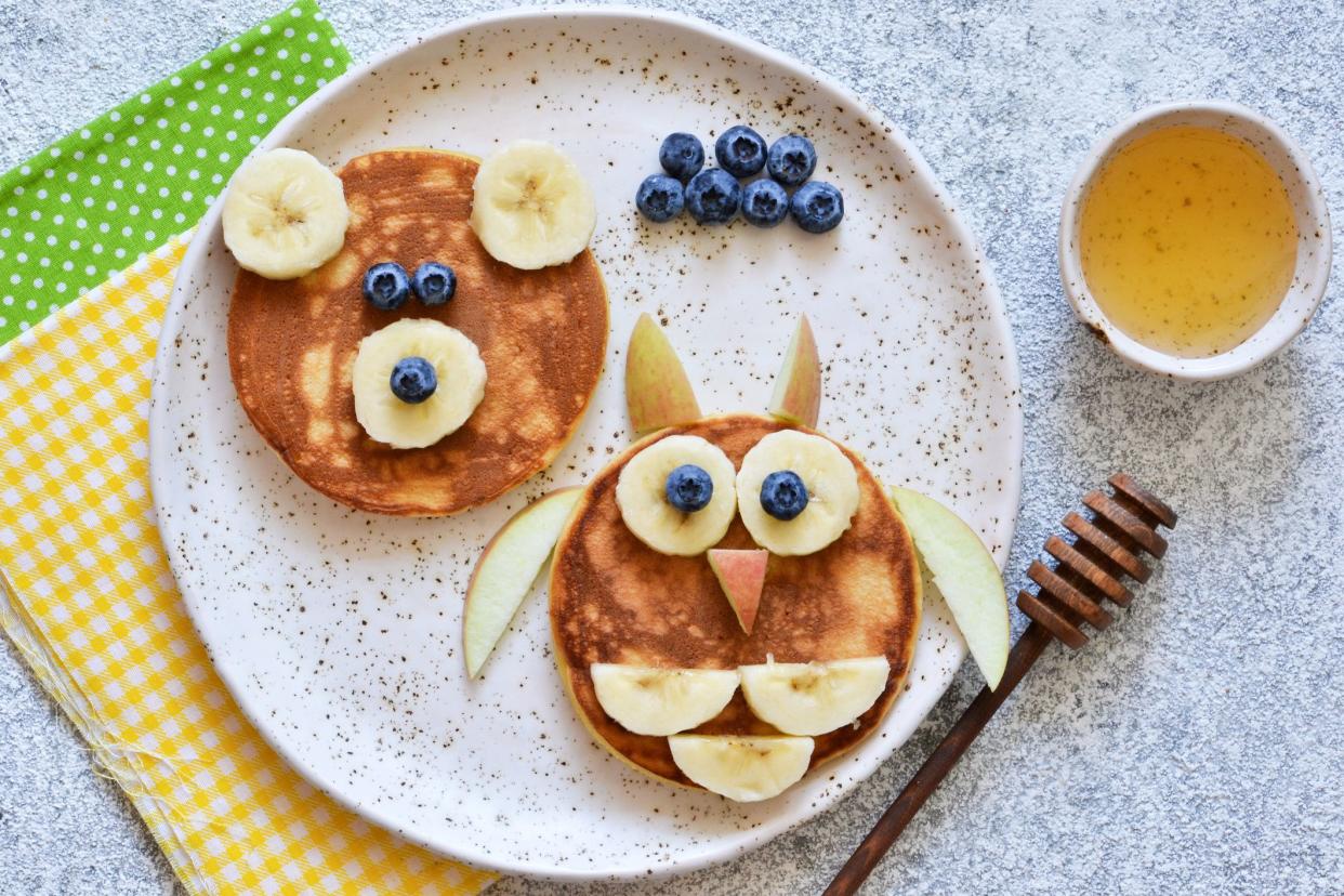 Funny pancakes for kids - bear and owl. Breakfast for children.