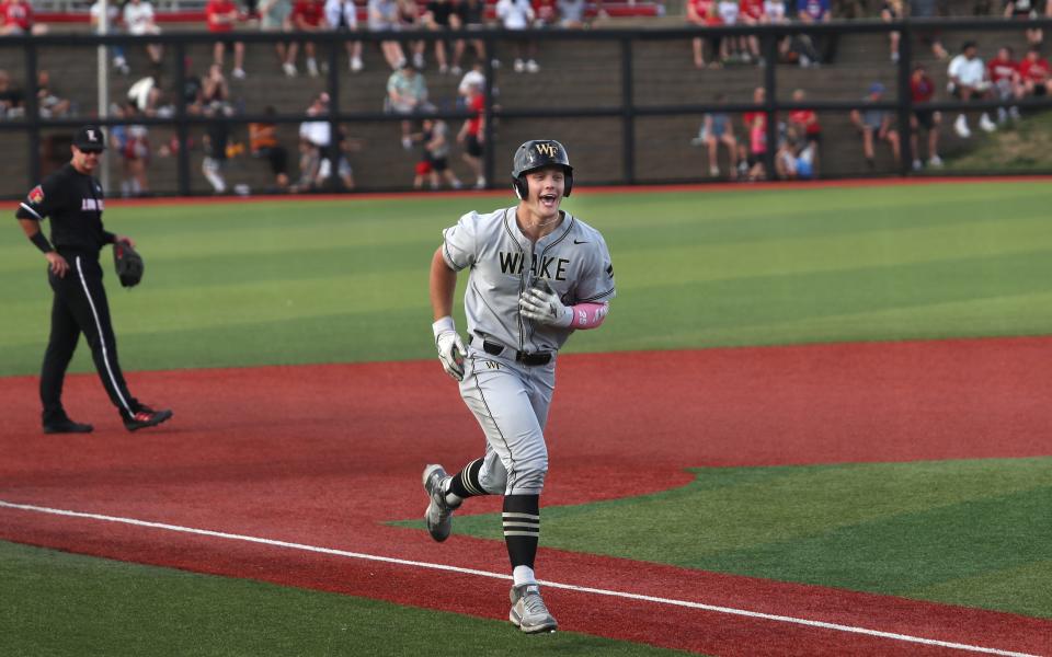 Wake Forest’s Brock Wilken celebrates his 3-run home run against Louisville. April 14, 2023.