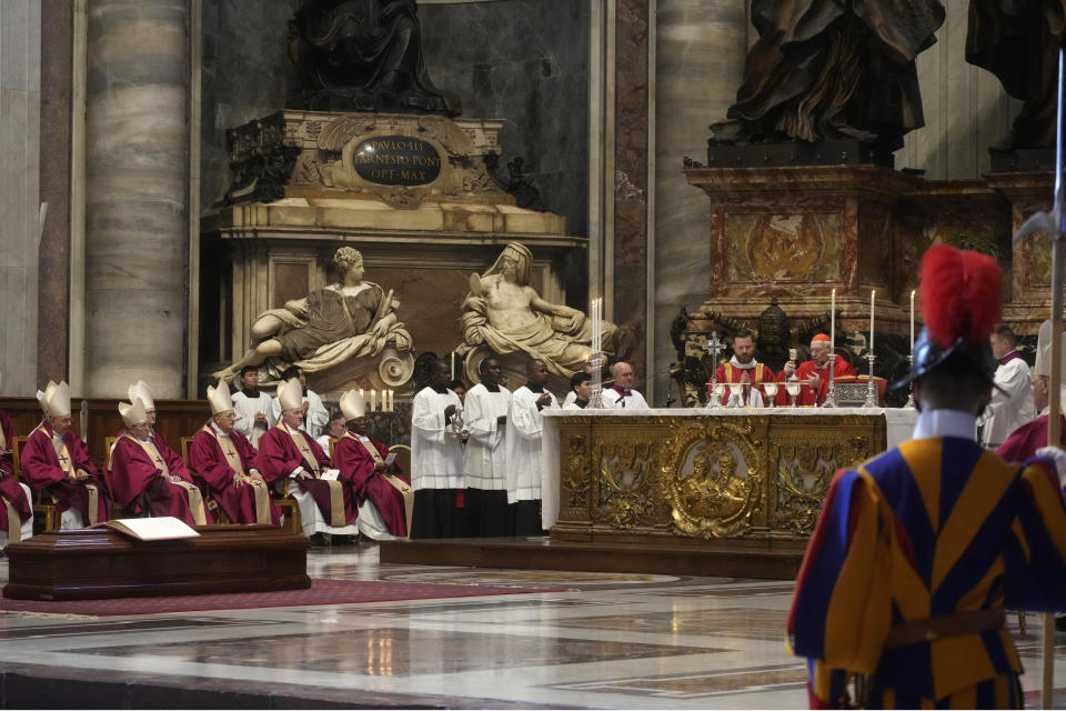 Cardinal Giovanni Battista Re, Dean of College of Cardinals, right, celebrates the funeral ceremony for Australian Cardinal George Pell in St. Peter's Basilica, at the Vatican, Saturday Jan. 14, 2023. Cardinal Pell died on Tuesday at a Rome hospital of heart complications following hip surgery. He was 81. (AP Photo/Gregorio Borgia)