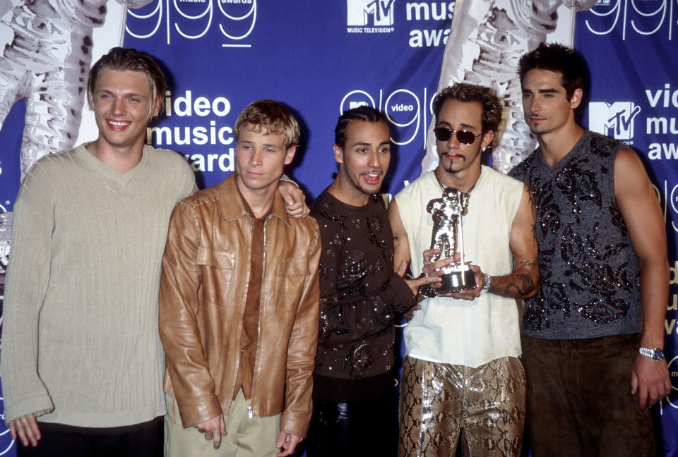 AJ revealed that the two bands were friends and the Chris Kirkpatrick and Howie D went to college together. Source: Getty