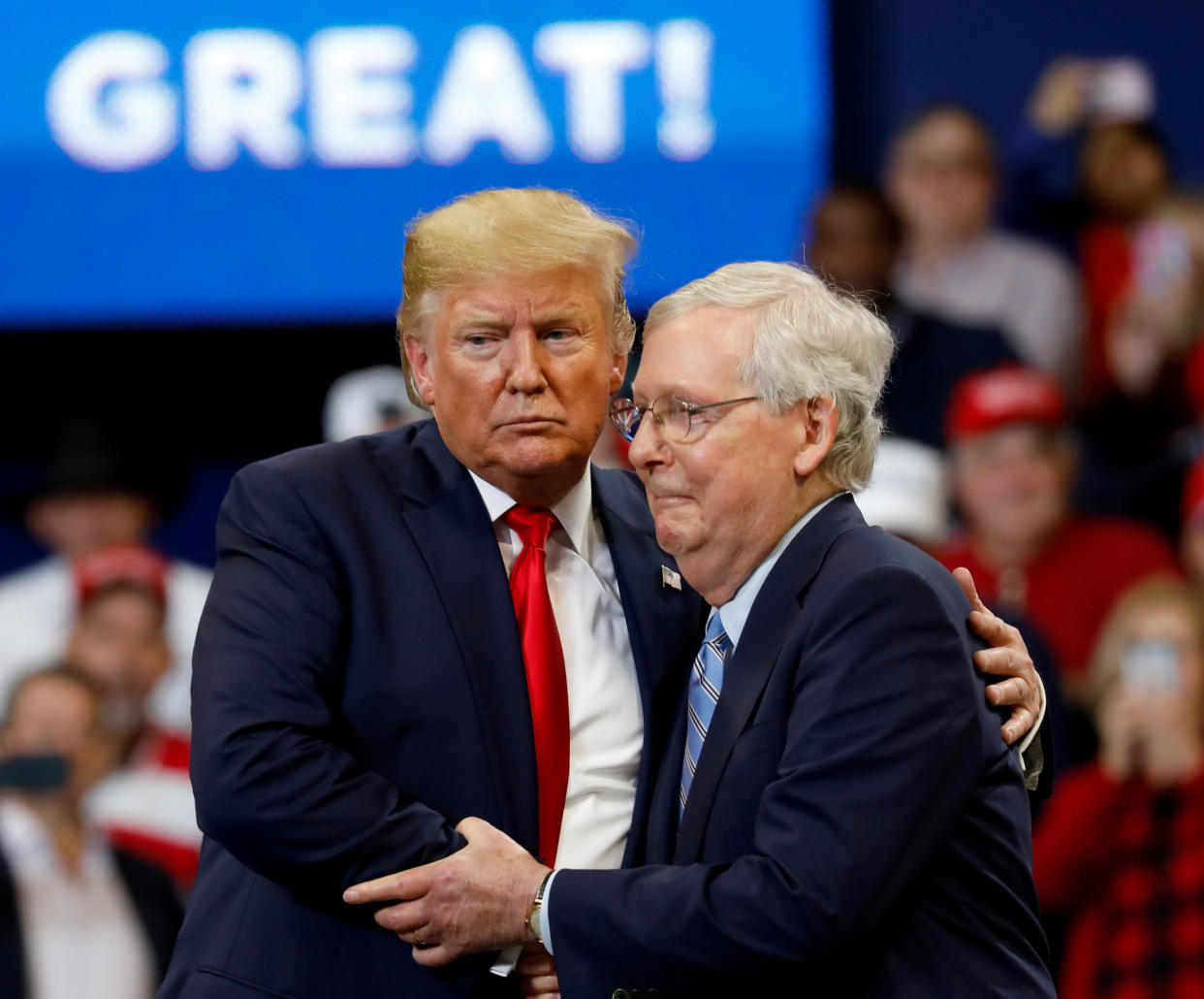 Senator Mitch McConnell (R-KY) hugs U.S. President Donald Trump at a campaign rally at the Rupp Arena in Lexington, Kentucky, U.S., November 4, 2019. REUTERS/Yuri Gripas     TPX IMAGES OF THE DAY