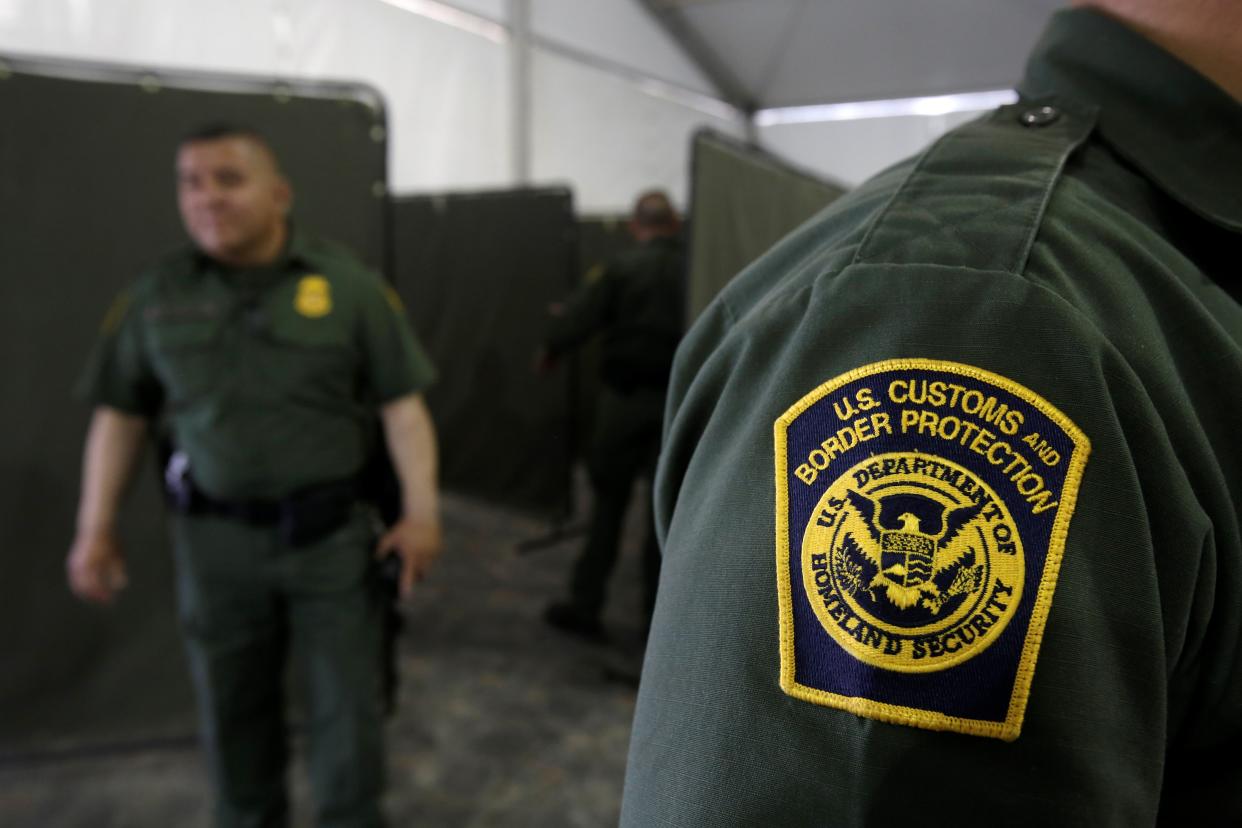 US Border Patrol agents are seen during a tour of US Customs and Border Protection (CBP) temporary holding facilities in El Paso, Texas, in May 2019 (REUTERS)