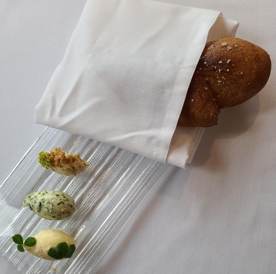 A butter flight paired with homemade bread at Summit House.