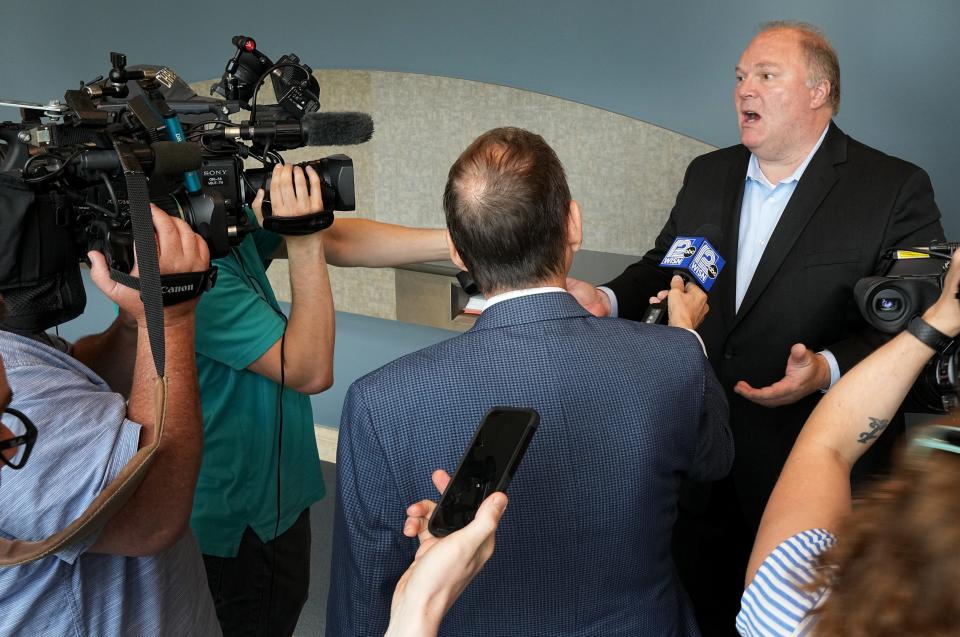 Former state Supreme Court Justice Michael Gableman talks to reporters Friday, June 10, 2022 in Dane County Court in Madison, Wis. Gableman was held in contempt after he refused to answer any questions about his handling of public records requests and lambasted a judge overseeing a lawsuit alleging Gableman is refusing to follow transparency laws governing his taxpayer-funded review of the 2020 election.