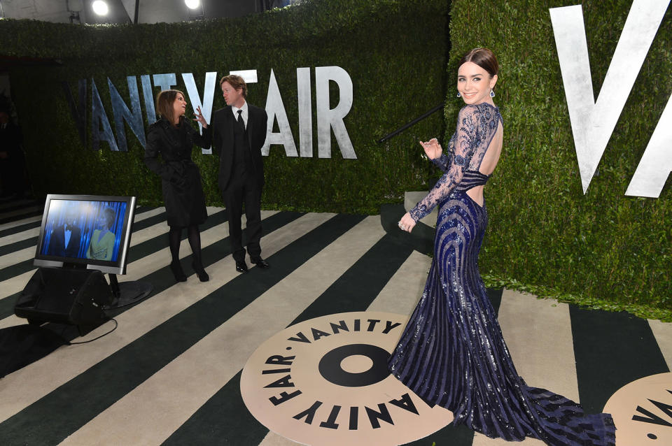 Lily Collins arrives at the 2013 Vanity Fair Oscar Party hosted by Graydon Carter at Sunset Tower on February 24, 2013 in West Hollywood, California.