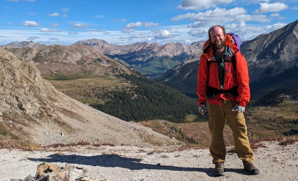 David Humeston, 42, a Mansfield native now of Columbus, stands at Anns Pass in Colorado during his recent trek to hike the Continental Divide Trail in 2023.