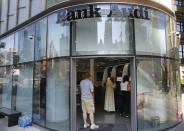 People use an ATM outside a closed bank, in Beirut, Lebanon, Wednesday, Oct. 30, 2019. Lebanese banks have been closed for the last two weeks as the government grapples with mass demonstrations that have paralyzed the country, but an even greater crisis may set in when they reopen Friday. (AP Photo/Hussein Malla)