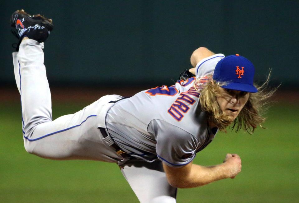 New York Mets starting pitcher Noah Syndergaard delivers to the Boston Red Sox in the first inning of a baseball game at Fenway Park, Friday, Sept. 14, 2018, in Boston.