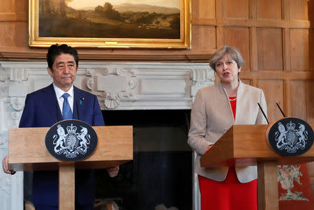 Britain's Prime Minister Theresa May and Prime Minister Shinzo Abe of Japan hold a joint news conference at Chequers, near Wendover, Britain April 28, 2017. REUTERS/Kirsty Wigglesworth/Pool