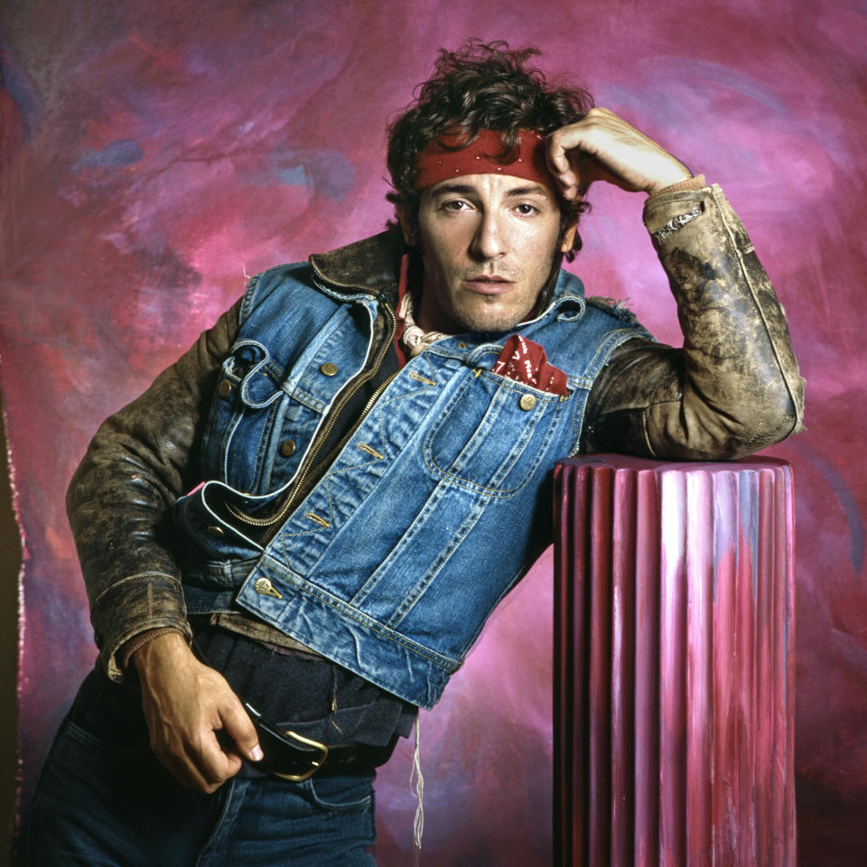 Bruce wearing a bandana and a jean jacket