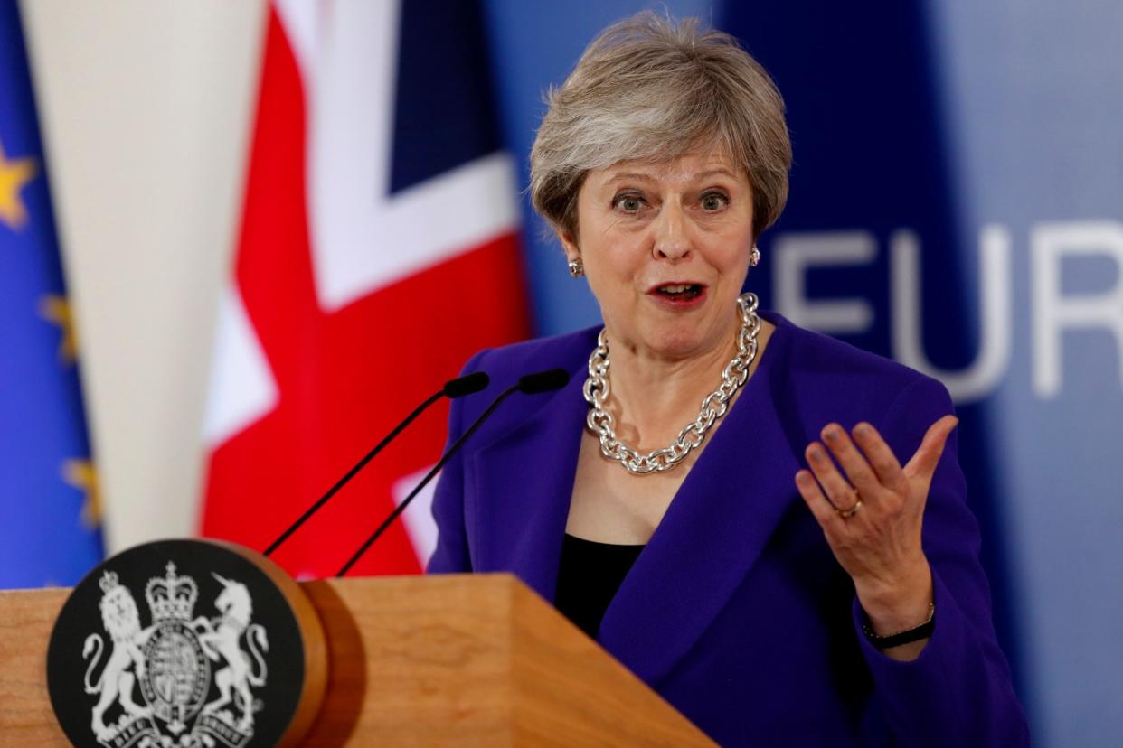 'Convinced we will get a good deal': Theresa May spoke at a news conference in Brussels on Thursday: AP