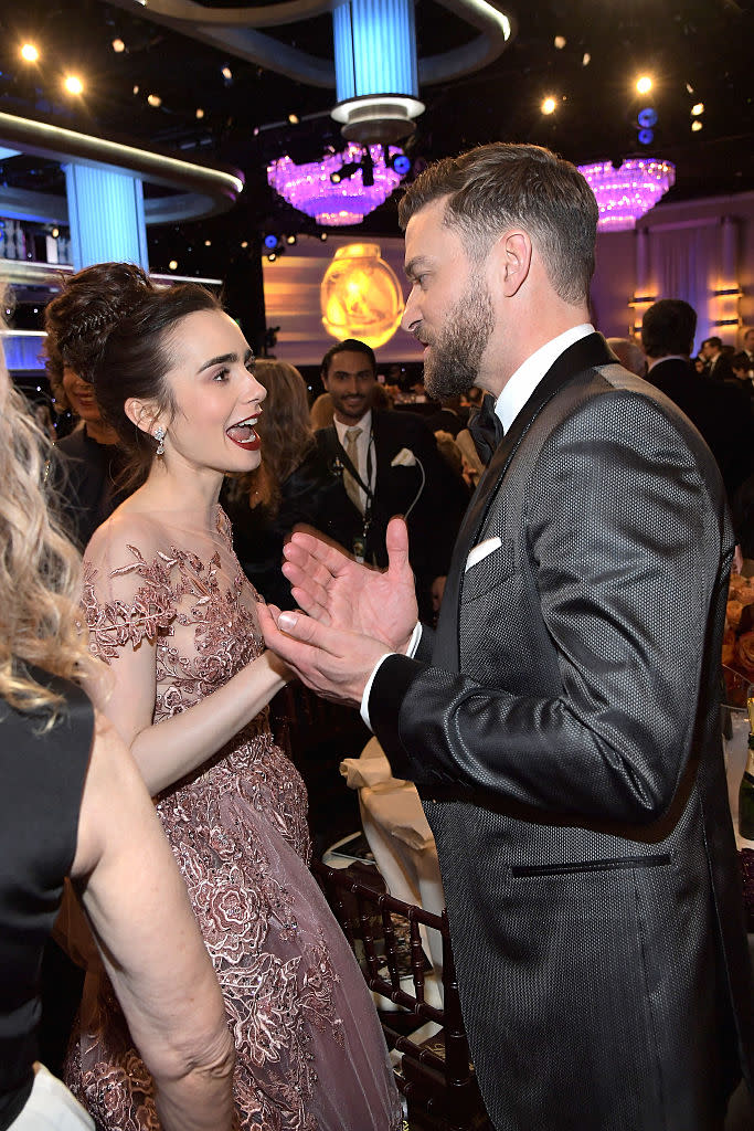 Wow, to be a fly on that wall, as Lily Collins talks to Justin Timberlake. (Photo: Getty Images) 