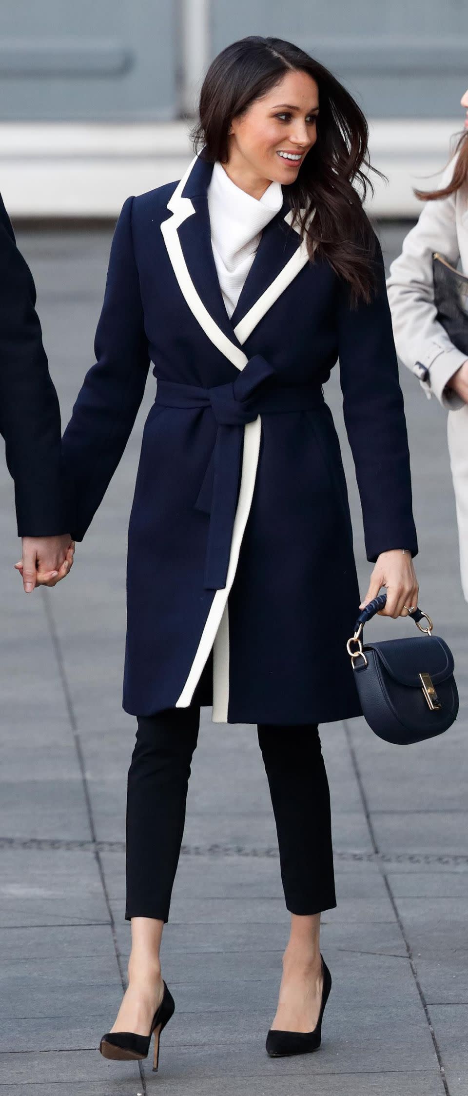 Meghan visited Birmingham, England in a J.Crew coat. Source: Getty