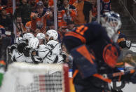 Los Angeles Kings celebrate a goal against Edmonton Oilers goalie Mike Smith (41) during the third period of Game 1 of an NHL hockey Stanley Cup first-round playoff series, Monday, May 2, 2022 in Edmonton, Alberta. (Jason Franson/The Canadian Press via AP)