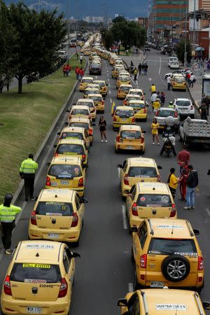 Taxi drivers protest against Uber in Bogota, Colombia, October 23, 2017. REUTERS/Jaime Saldarriaga