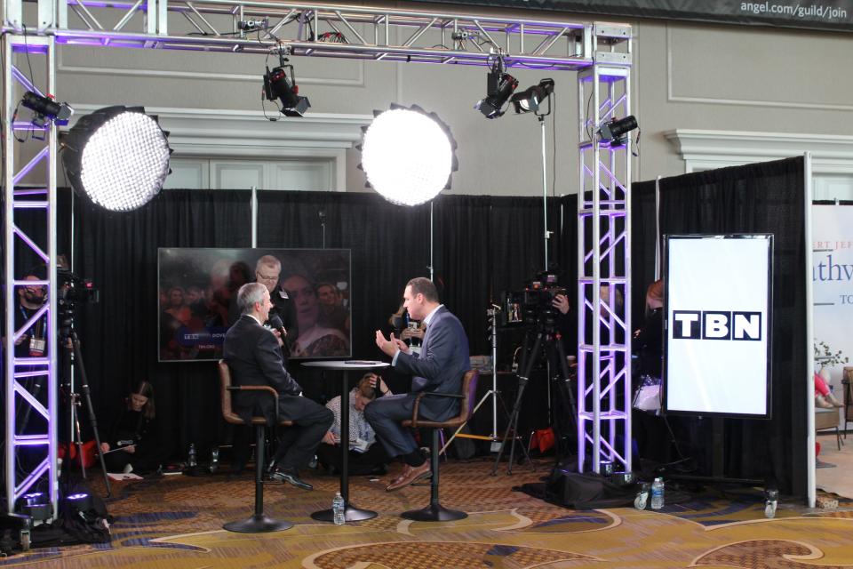 Robert Jeffress, pastor of First Baptist Church Dallas and an ally of former President Donald Trump, speaks with Trinity Broadcasting Network, a major Christian television company partly based in the Nashville area during the National Religious Broadcasters meeting in Nashville, Tenn., Wednesday, Feb. 21, 2024.