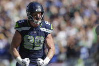 Seattle Seahawks tight end Will Dissly reacts after scoring a touchdown during the first half of an NFL football game against the Atlanta Falcons Sunday, Sept. 25, 2022, in Seattle. (AP Photo/John Froschauer)