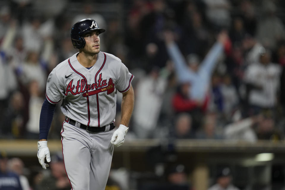 Atlanta Braves' Matt Olson watches his three-run home run during the ninth inning of a baseball game against the San Diego Padres, Tuesday, April 18, 2023, in San Diego. (AP Photo/Gregory Bull)