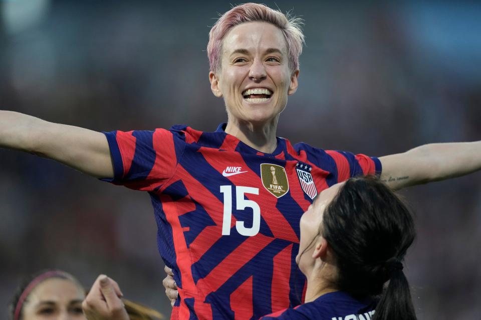 U.S. forward and Palo Cedro native Megan Rapinoe (15) celebrates a goal by Taylor Kornieck against Colombia during the second half of an international friendly soccer match Saturday, June 25, 2022, in Commerce City, Colo. President Joe Biden will present the nation's highest civilian honor, the Presidential Medal of Freedom, to 17 people, including Rapinoe, at the White House on July 7.