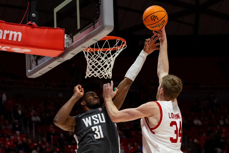 Utah Utes center Lawson Lovering (34) shoots the ball with Washington State Cougars guard Kymany Houinsou (31) on defense during a men’s college basketball game between the University of Utah and Washington State University at the Jon M. Huntsman Center in Salt Lake City on Friday, Dec. 29, 2023. | Megan Nielsen, Deseret News