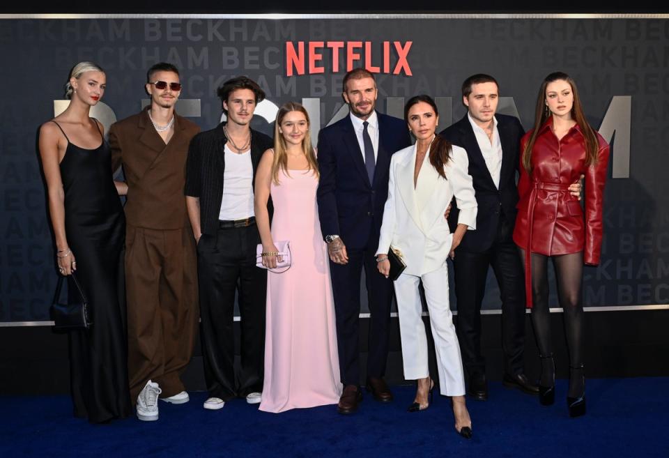 (From left) Mia Regan, Romeo Beckham, Cruz Beckham, Harper Beckham, David Beckham, Victoria Beckham, Brooklyn Peltz Beckham and Nicola Peltz Beckham (Gareth Cattermole/Getty Images)