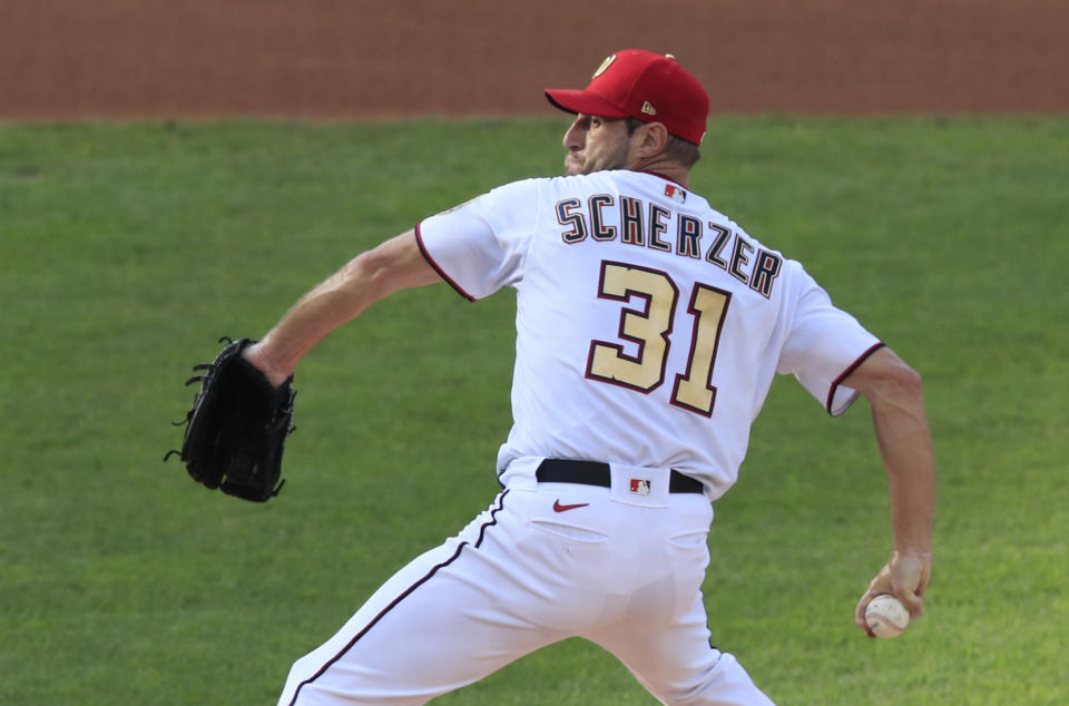 Washington Nationals starting pitcher Max Scherzer (31) throws during the first inning of a baseball game against the New York Mets in Washington, Wednesday, Aug. 5, 2020. (AP Photo/Manuel Balce Ceneta)